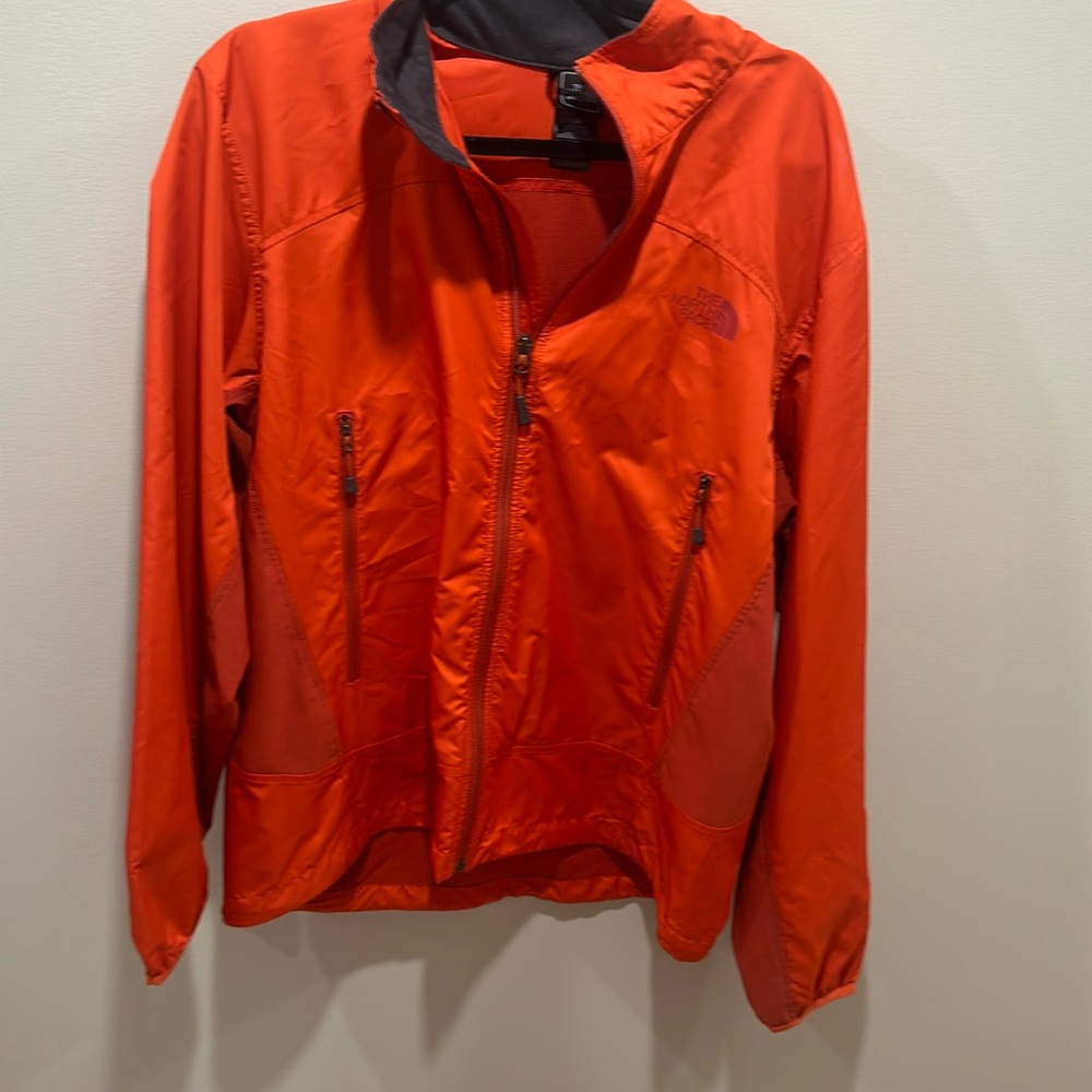 Orange windbreaker jacket
